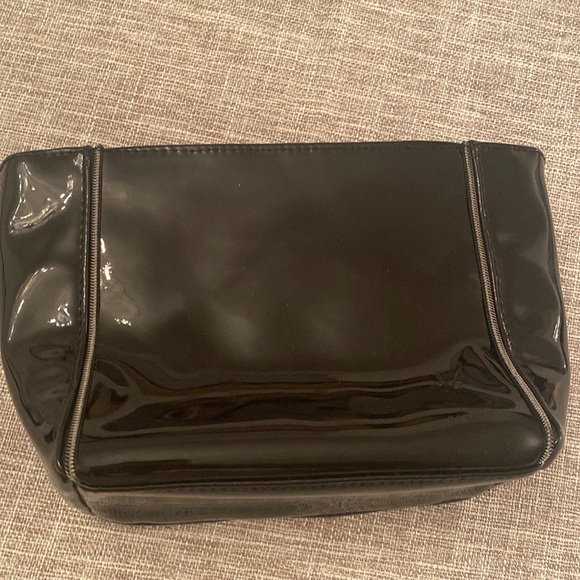 50% off..
YSL makeup pouch - Picture 1 of 6